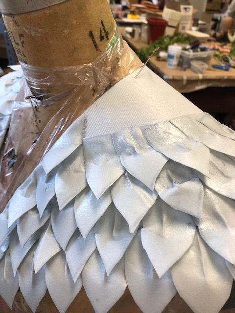 White feather shoulder piece for a costume